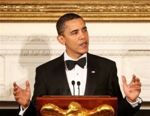 Obama pledges to slash deficit after initial increase.