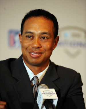 Tiger Woods is smiling – nay, licking his chops – as he returns to action at The Masters Golf Tournament 2010.