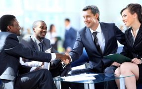 Men shake hands on fast cash deal