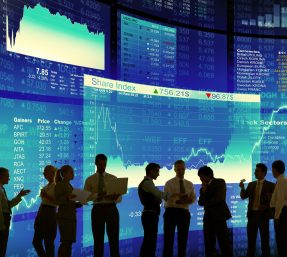 Businessmen discuss short term loan market short term loans in the marketplace